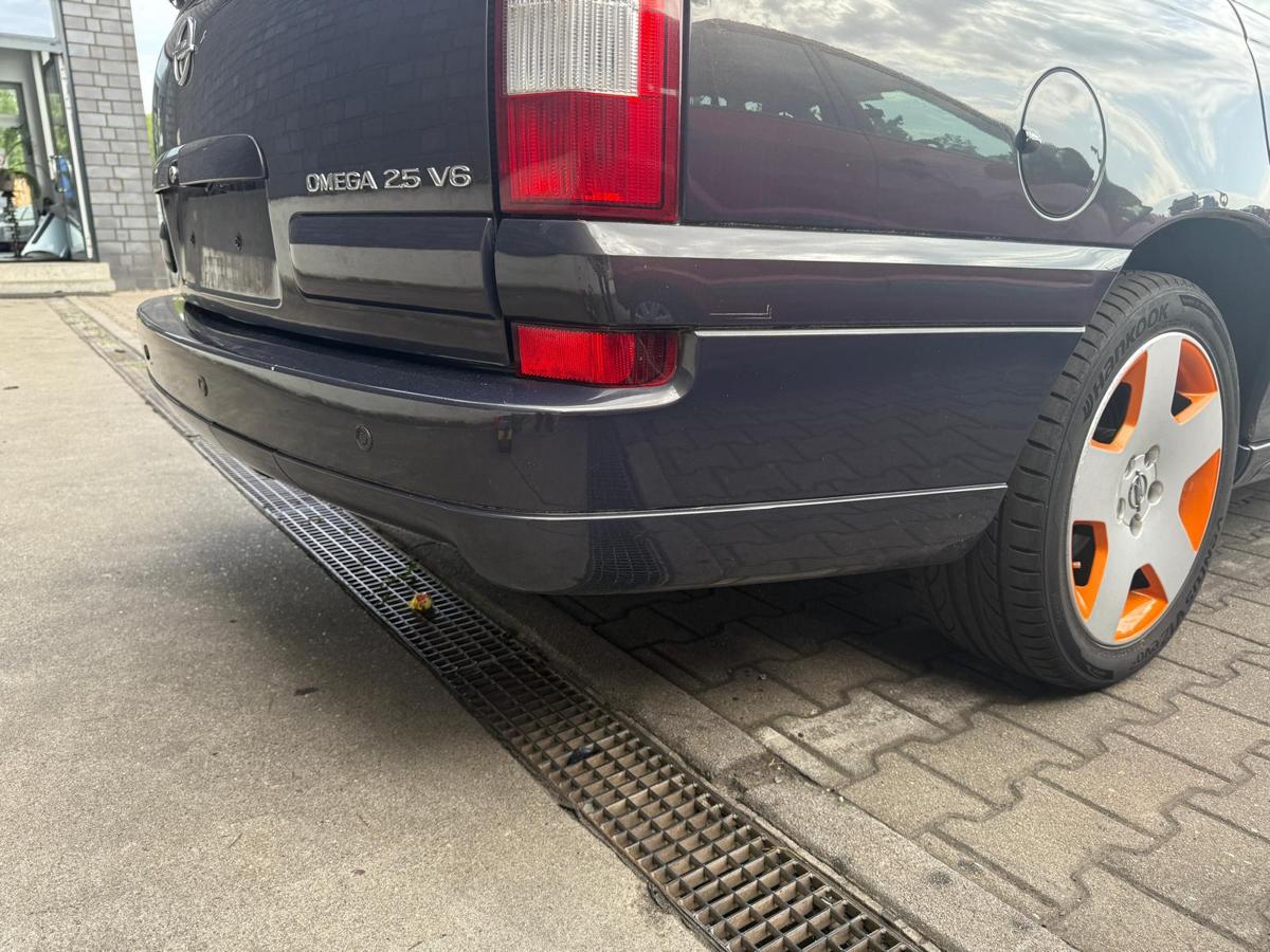 Opel Omega B original Stoßstange Stoßfänger hinten Z385 Graphit II Facelift Caravan BJ00